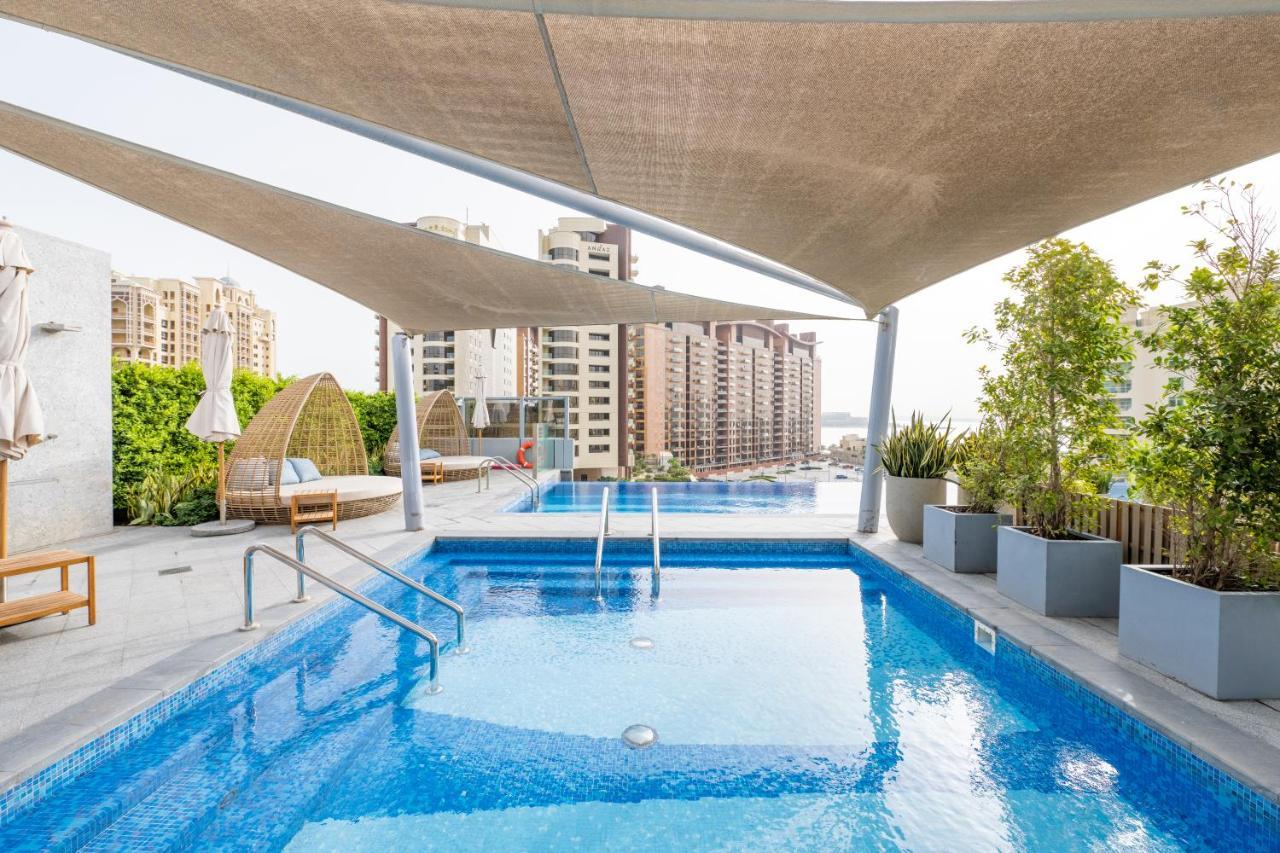 دبي Ultra Luxury Palm Tower With Shared Hotel Facilities المظهر الخارجي الصورة